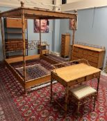 A faux bamboo four poster bed together with a matching pair of bedside cabinets, a dressing chest,