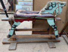 A 20th century small rocking horse on a fixed rocker base,