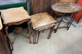 An Edwardian mahogany occasional table together with a nest of three tables and an oak occasional
