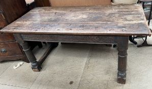 A 17th century style oak refectory table,