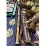 A brass and leather three drawer telescope together with a Korean Imperial postal system four and