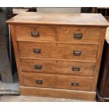 An Edwardian chest with a rectangular top above two short and three long graduated drawers on a