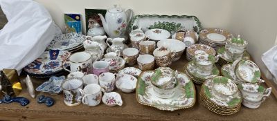 A Coalport floral decorated part tea service together with a Doric china part tea service,