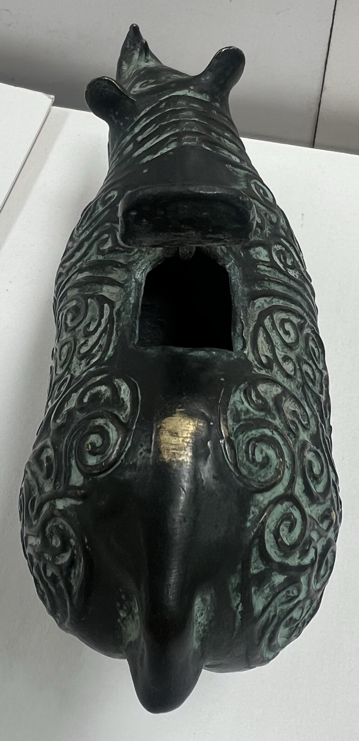 A Zhou style bronze rhinoceros, with scrolling decoration, - Image 2 of 2
