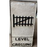 A cast iron Railway type sign for a level crossing in cream with black writing, 58.