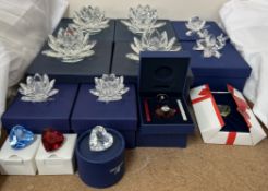 Swarovski - a collection of boxed crystal flowers including a rose,