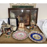 Three German pottery lidded steins together with assorted decorative plates, cased fish set,