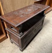 A 20th century oak monks bench