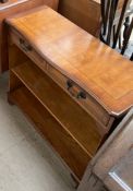 A yew bookcase together with an oak box stool, loom laundry basket,