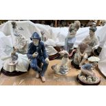 Various Nao porcelain figures including a fisherman smoking a pipe, young lady and kitten,