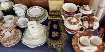 A pottery part tea service together with other part tea sets, gold wire decorated sash,
