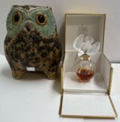 A Lalique scent bottle in the form of a dove for Nina Ricci together with a Lladro owl