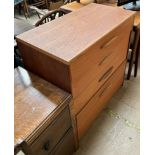 A G-Plan teak dressing table together with a G-plan teak chest of drawers and a head board