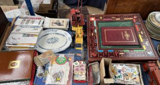 A collectors edition Monopoly board together with tin plate toys,