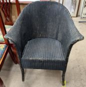 A loom chair painted black