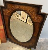 An oak framed wall mirror