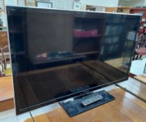 A Panasonic 50" television Model Number TX-L50EM5B and remote control CONDITION REPORT: