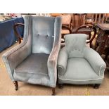 An Edwardian upholstered wing back chair on square tapering legs and casters together with a