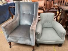 An Edwardian upholstered wing back chair on square tapering legs and casters together with a