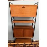A mid 20th century Ladderax type unit with a two sections and two shelves