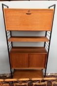 A mid 20th century Ladderax type unit with a two sections and two shelves