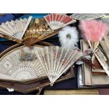 A large collection of fans with bone and mother of pearl guard sticks, paper,