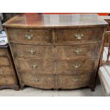 A 19th century mahogany chest with a D shaped top above two short and three long drawers on bracket