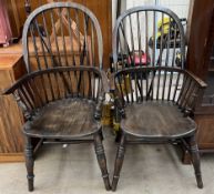A pair of stick back Windsor chairs on ring turned legs