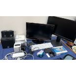 An Iiyama Prolite B2480HS monitor together with a Samsung Monitor, keyboards, speakers,