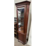 A teak tea trolley together with a teak low table, yew occasional table, bookcase,