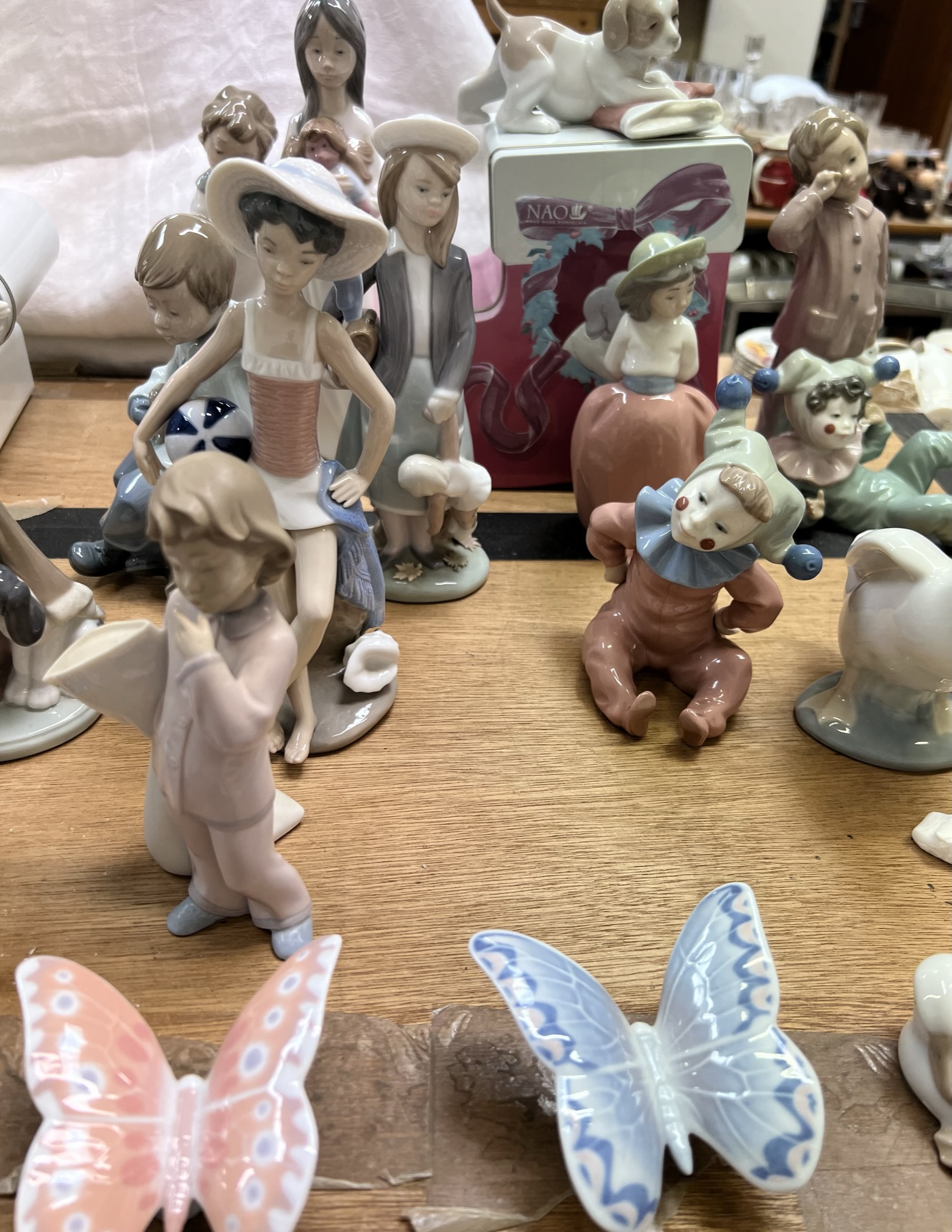 A collection of Lladro and Nao porcelain figures including a balloon girl, clown, children, - Image 4 of 4