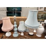 A pottery table lamp together with four other table lamps