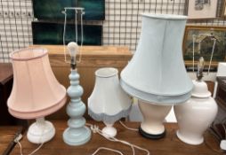 A pottery table lamp together with four other table lamps