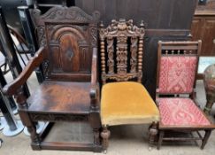 A 17th century style oak elbow chair together with a carved chair and a nursing chair