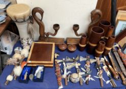 A Mud Drum, together with carved treen candlesticks, American Indian replica axes,