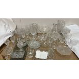 Various glass vases together with drinking glasses,