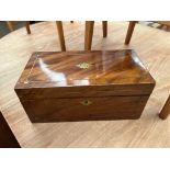 A 19th century mahogany tea caddy,