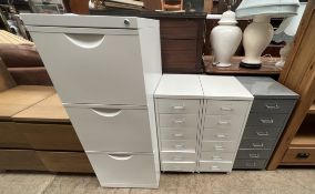 A modern three drawer filing cabinet together with three filing drawers