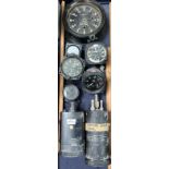 A US Navy bulk head clock case together with a Piper True Air Speed indicator,
