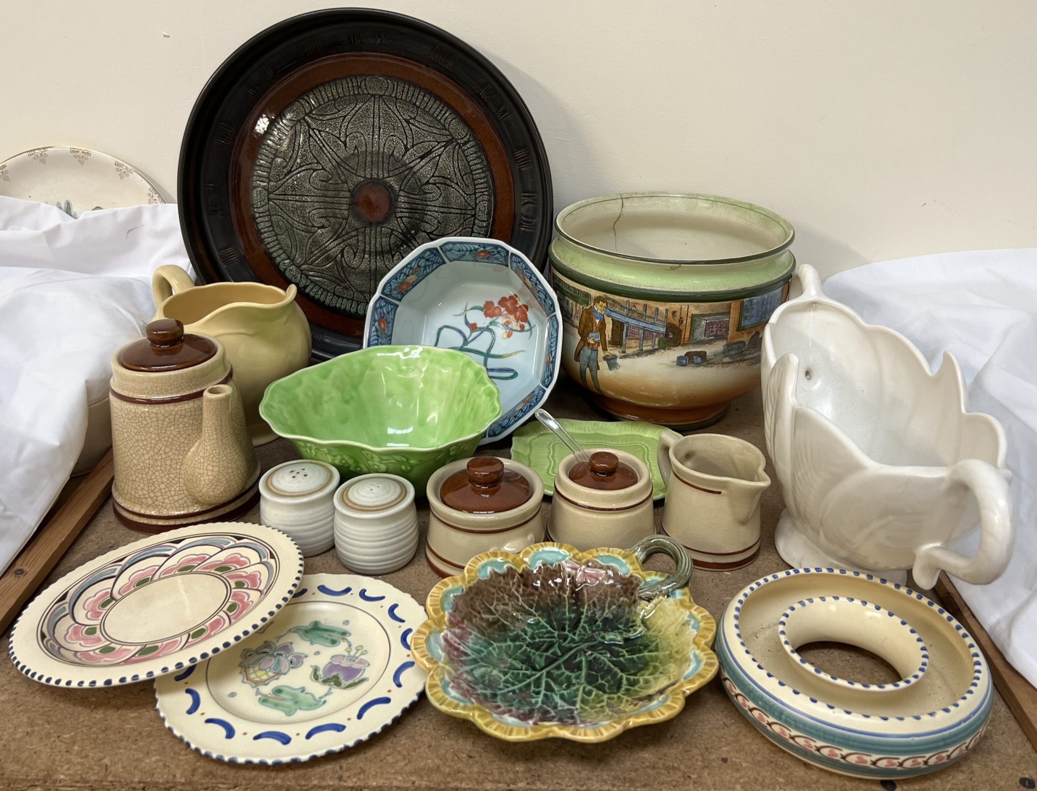 A large Celtic pottery bowl together with a Royal Doulton Jardiniere,