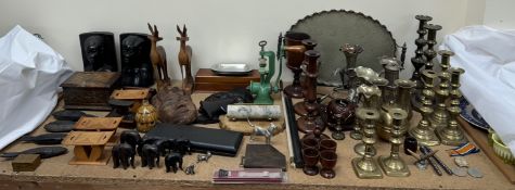 Various African carvings of figures and animals together with an electroplated tray,