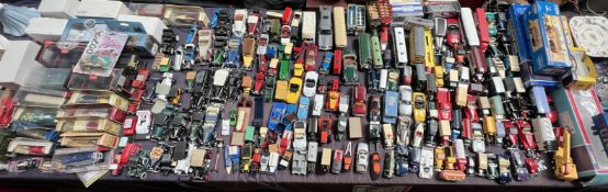 A large collection of model cars including Corgi, Lledo,