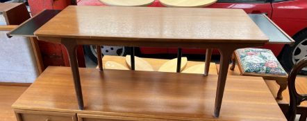 An A H McIntosh & Co Ltd Kirkaldy Scotland mid century teak extending coffee table,