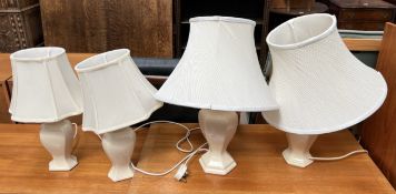 Two pairs of pottery table lamps
