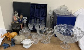 A Japanese pottery figure group of two figures together with a set of six Stuart crystal wine