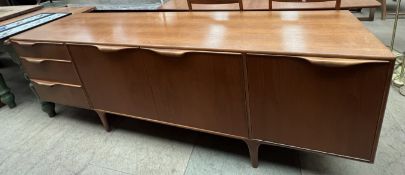 A mid 20th century teak A. H.