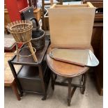 An oak gateleg dining table together with an oak tea trolley, mid 20th century wall mirror,