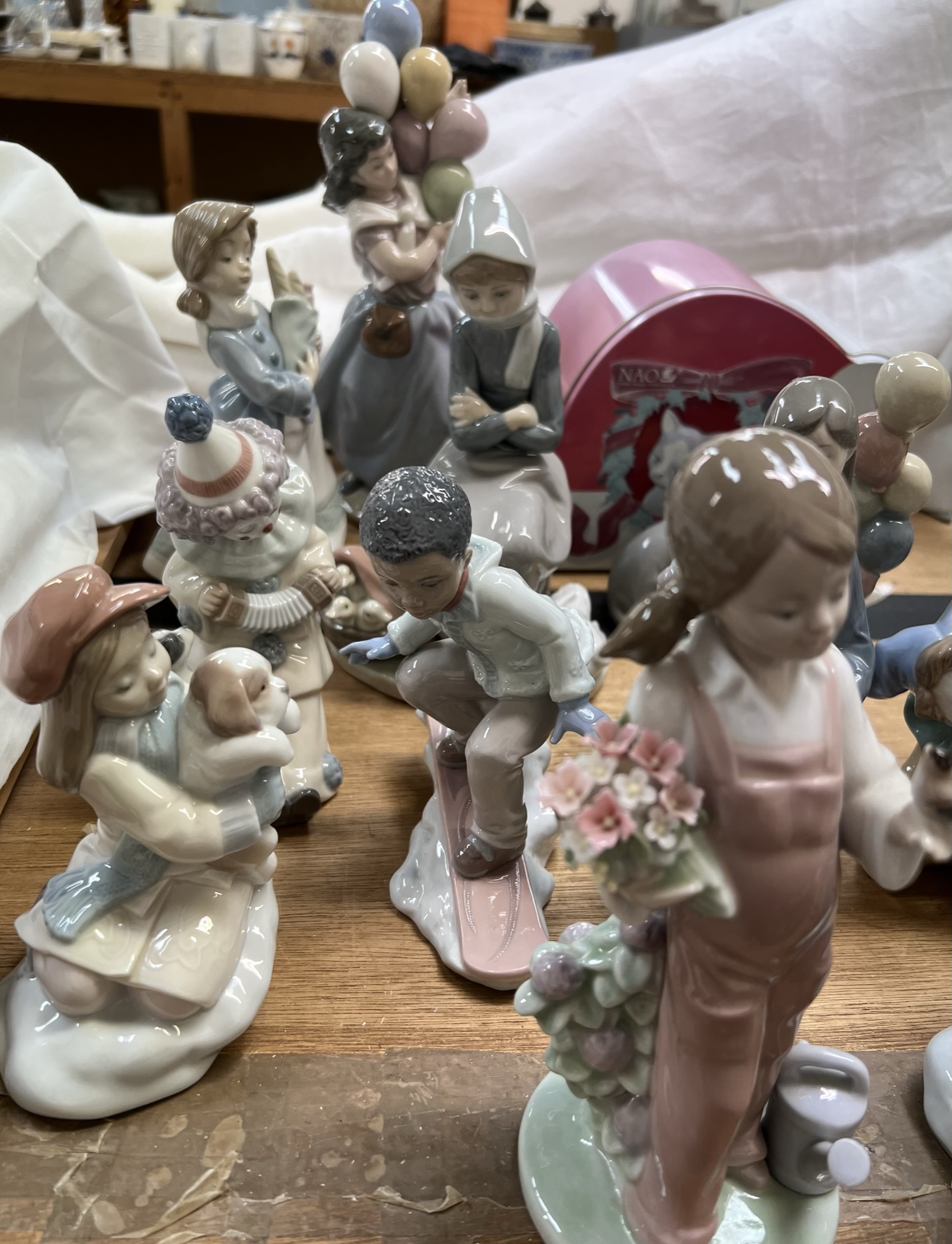 A collection of Lladro and Nao porcelain figures including a balloon girl, clown, children, - Image 2 of 4