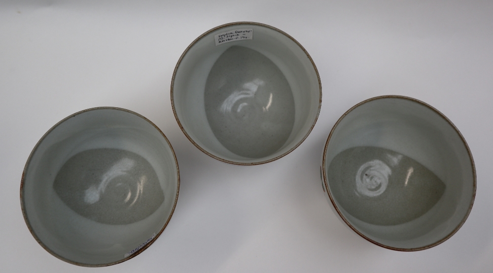Three assorted stoneware footed bowls in the Chawan style, decorated with flowers and lines, - Image 3 of 6