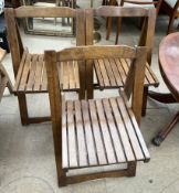 A set of three folding chairs